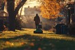 © Vooglo.com - A person walking behind a green lawn mower on a sunny evening in a spacious backyard