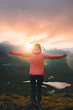 © EVERST - Woman travel hiking in mountains solo, girl happy raised hands enjoying sunset view adventure healthy lifestyle active vacations outdoor tour freedom concept