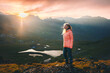 © EVERST - Woman enjoying sunset view in mountains travel solo, girl hiking adventure active vacations outdoor trip freedom awakening concept