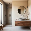 © Asifalatif - 'Modern minimalist bathroom interior with a warm, neutral color palette, featuring a round mirror above a floating wooden vanity with a stone vessel sink. The space includes a walk-in shower with a co