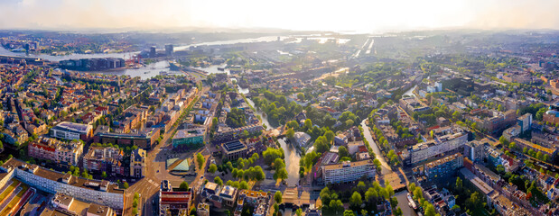 Wall Mural - Amsterdam, Netherlands. Watercolor illustration. Panorama of the city from the air. Summer