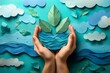 © Atchariya63 - Hands holding paper leaves and water, symbolizing environmental conservation.