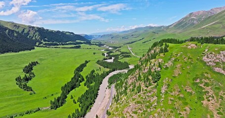 Poster - A winding river flows through green valley nestled between mountains