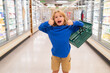 © Volodymyr - Child with shopping basket. Kid choosing fruits and vegetables during shopping at vegetable supermarket. Little kid going shopping. Healthy food for kids.