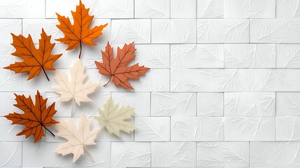 Wall Mural - A serene arrangement of colorful autumn leaves on a textured white background, capturing the essence of fall.