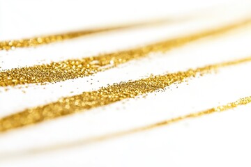 Wall Mural - A close-up shot of gold glitter on a white surface