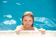 © Volodymyr - Portrait of a cute child boy in swimming pool. Caucasian face. Funny kids summer activities.