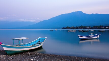 Naklejka na meble Peaceful lake with fishing boats at dawn