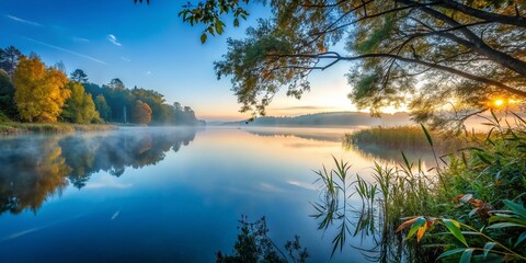 Wall Mural - Misty Lake at Dawn: Serene Lakeside Landscape with Cool Air, High Depth of Field