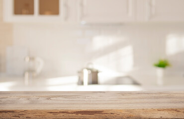 Wall Mural - aged empty wooden table top on abstract white kitchen furniture interior background