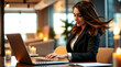 © MdTowhidul - young businesswoman working on a laptop in an office