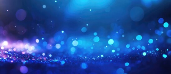 Defocused blue and purple concert stage lights with shimmering bokeh effects and empty space for creative text on a festive background
