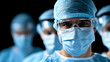 © VISUAL BACKGROUND - A group of surgeons wearing surgical masks and goggles