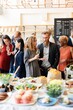 © Rawpixel.com - Diverse group at a social event, enjoying drinks and conversation. Men and women of various ethnicities mingling, sharing stories, and networking. Corporate party drinking and networking.