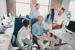 © deagreez - Photo of teamwork startup partners discussion paperwork comfortable nice creative startup office loft room interior
