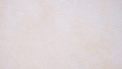 Poster - A white wall with a few small dots on it. The wall is very plain and unadorned