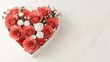 © Oksana - A bouquet of red and white roses in a heart shape