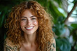 © Midea  - Woman with curly hair and a smile surrounded by colorful flowers in a lush garden.