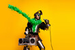 © deagreez - Humorous knight in full armor singing with a microphone and boombox against a yellow background
