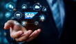 © REZAUL - Businessman Holding Holographic SAP System Interface