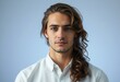 © iushakovsky - Portrait of a male figure with long hair and a relaxed expression