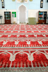 Wall Mural - Inside the Saigon Central Mosque ( Masjid Musulman) built in 1935. Prayer hall with red carpet.  Ho Chi Minh City.  Vietnam.