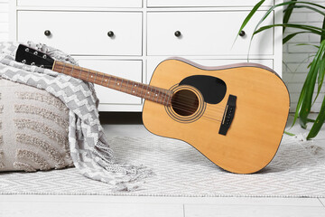 Wall Mural - Modern acoustic guitar on floor in stylish living room