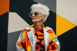 © Dream Decko - Portrait of a stylish senior woman wearing modern geometric and vibrant fashion with a confident attitude