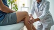 © vitanovski - Physiotherapist Assessing Patient's Leg During a Rehabilitation Session in a Clinic