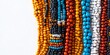 © NE97 - Artistic display of colorful African beaded jewelry, perfect for holiday designs, craft promotions, or lifestyle blogs celebrating creativity and craftsmanship.