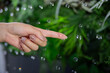© Karori Production - A hand in kimono touching a water droplet that is floating in the air, Water Pearl from Japan