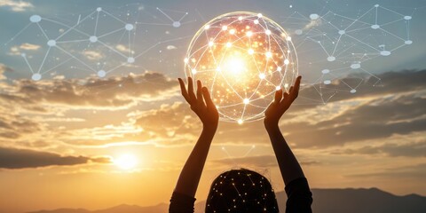 Silhouette of a person holding a glowing orb representing global network connectivity at sunset