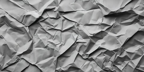 Sticker - Textured gray crumpled paper background with varied folds and shadows creating a dynamic, layered effect ideal for design and digital projects.