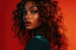 © HO - A beauty editorial image of a model with voluminous waves, her hair cascading over her shoulders in luxurious curls.