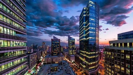 Aufkleber - Stunning city skyline illuminated at dusk with vibrant clouds and modern architecture