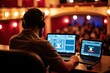 © velikiyzayats - Dynamic Sound Engineer at Work in a Lively Theater During a Live Performance, Capturing the Essence of Audio Production