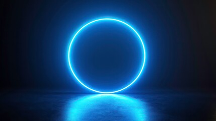 Wall Mural - Glowing blue neon circle light on dark background, reflecting on floor.