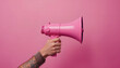 © artmozai - Amplifying the Message: A Pink Megaphone on a Rosy Backdrop