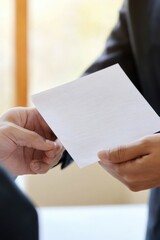 Canvas Print - Two people exchanging papers, business transaction or personal agreement