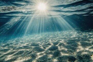 Wall Mural - Bright sunlight shining down through calm water with ripples