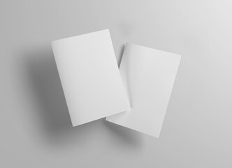 Wall Mural - two floating magazine covers mockup on white background with soft shadows. 3d rendering