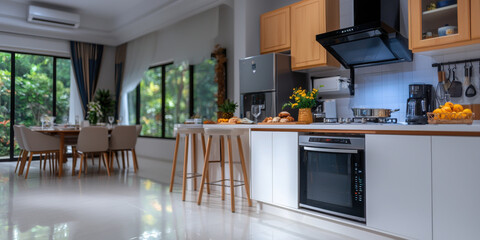 Wall Mural - Modern kitchen with sleek design, natural light, and dining area