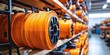 © Umnat - The striking contrast of orange cables resting on rustic wood.