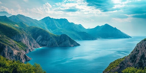 Aufkleber - Scenic view of mountains alongside the sea, creating a breathtaking backdrop. The contrast of mountains and sea offers a stunning visual experience, highlighting the beauty of nature s landscape.