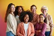 © WoodHunt - A group of women stands together in full view, enthusiastically celebrating International Women's Day. The colorful backdrop is lively, leaving plenty of space for a quote or message.