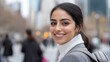 © Ari - Arabian business woman walking in street among skyscrapers in new york city