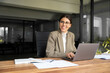 © Stock 4 You - Smiling professional financial it specialist latin hispanic business lady working on laptop pc sitting in office. Middle eastern indian woman dreaming using computer technology app for work online