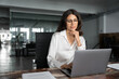 © Stock 4 You - Focused professional financial it specialist latin hispanic business lady working concentrated on laptop pc sitting in office. Middle eastern indian woman using computer technology app for work online