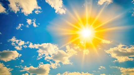 Aufkleber - Bright sun emitting rays against a clear blue sky with scattered clouds Copy Space