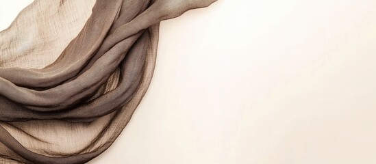 Leinwandbilder - Brown silk fabric draped elegantly over a neutral background with ample Copy Space for text placement